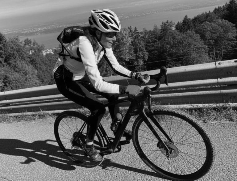 Becky Ramsay cycling up Zugerberg on her gravel bike